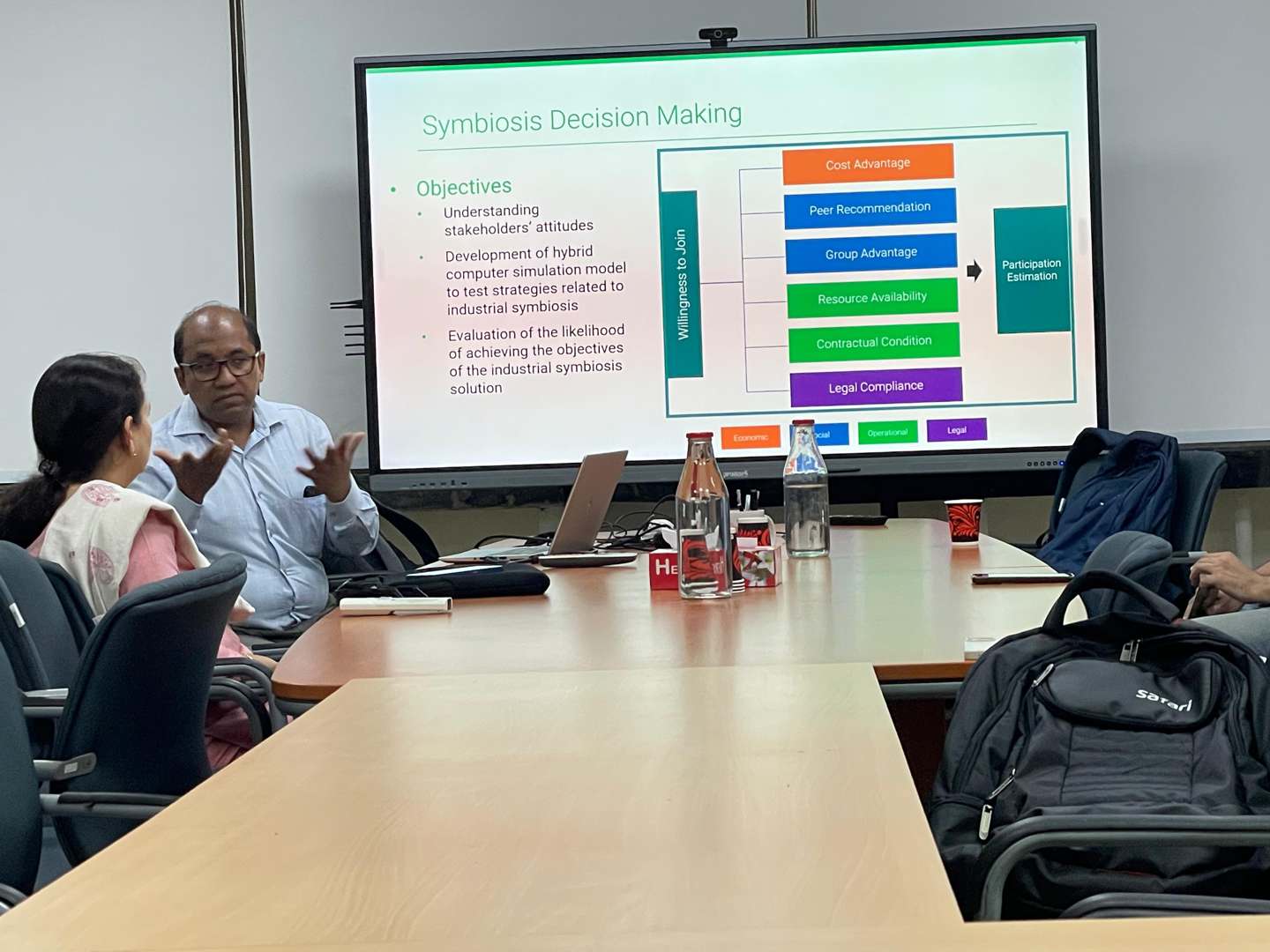 Dr. Boli Chen discussing his research with attendees